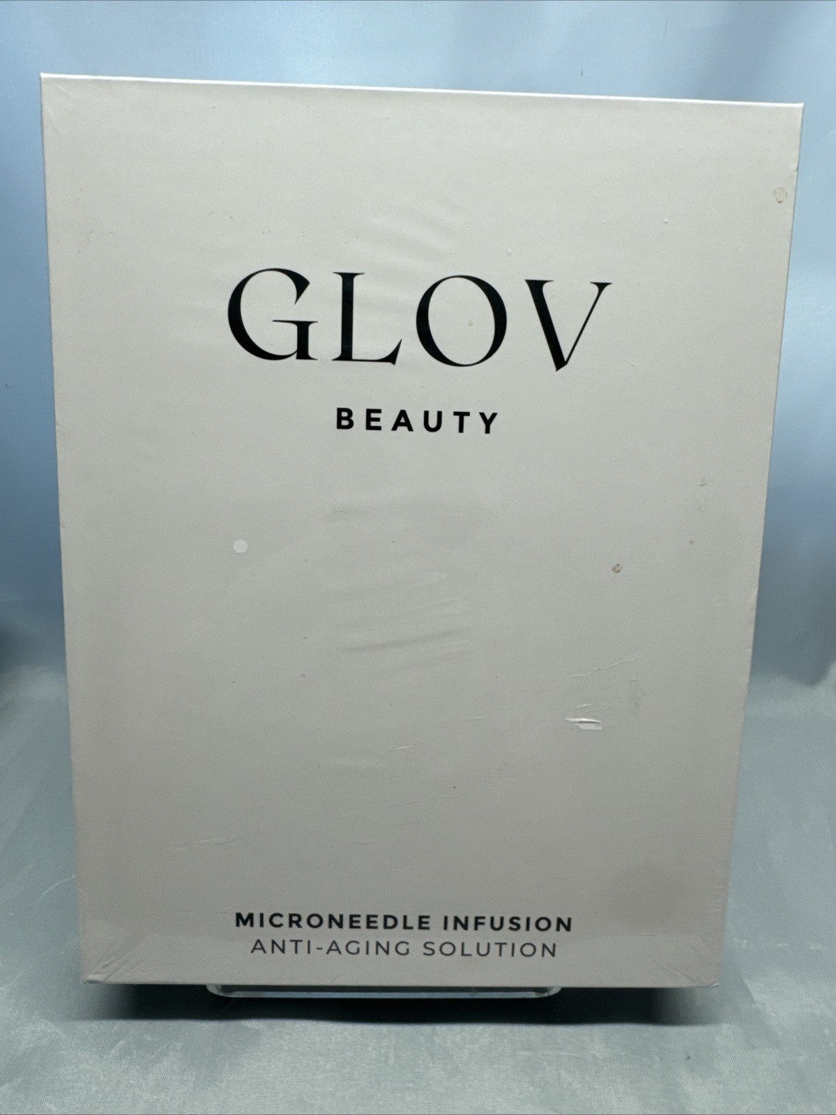 Glov Beauty Microneedle Infusion System and 4 extra Needle Heads Sealed in Box