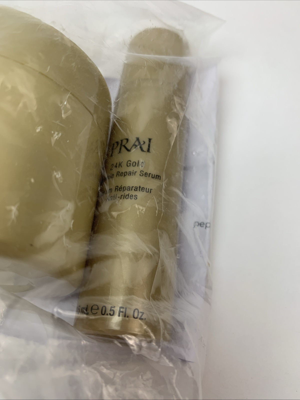 NEW PRAI 24K Gold Wrinkle Repair Creme 1oz + Serum 0.5oz Duo HTF