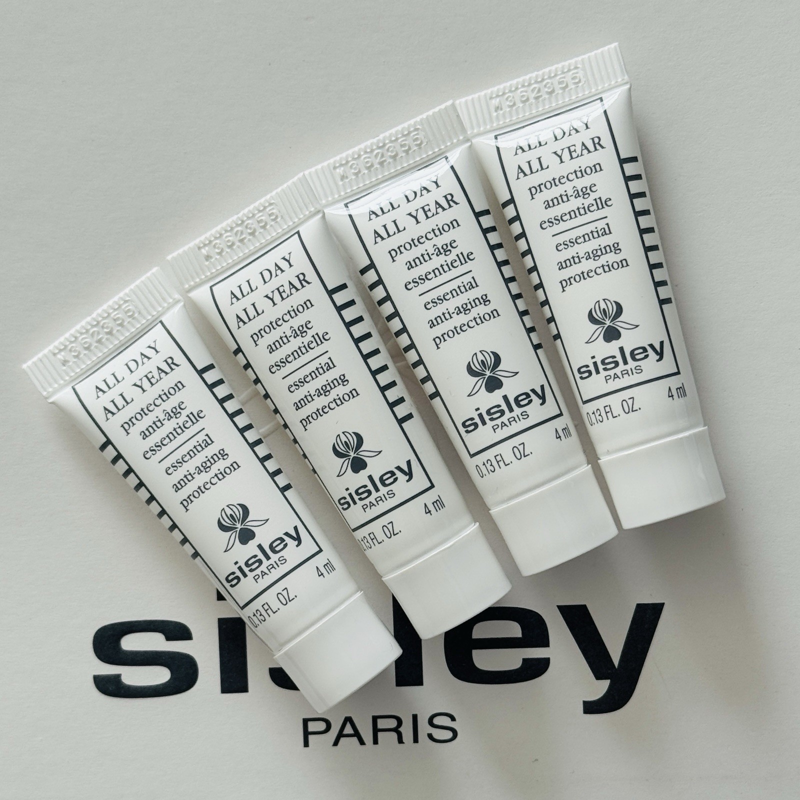 4x Sisley All Day All Year Essential Anti-Aging Protection – 4ml/.13oz ea.