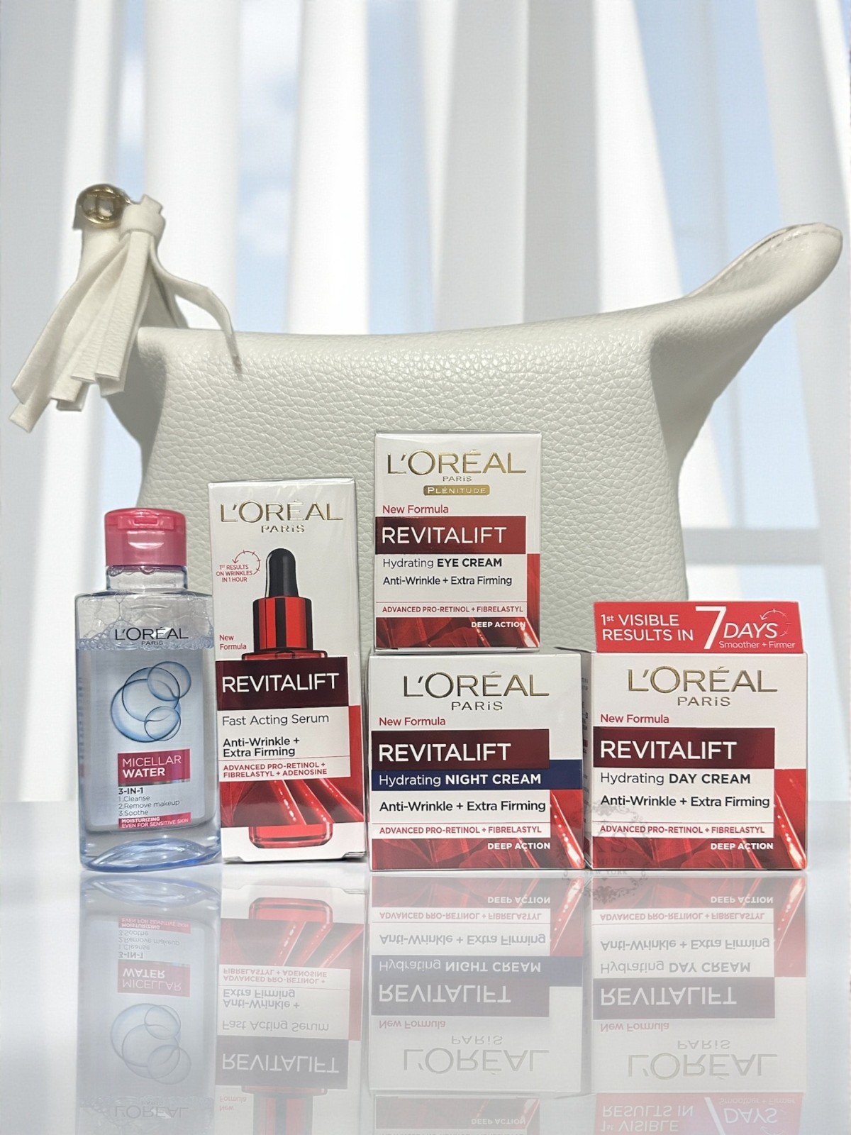 Loreal Paris Revitalift Anti-Wrinkle & Extra Firming Routine 5 PCS + Pouch